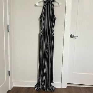 Black and white pinstripe jumpsuit with pockets.